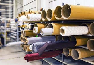 industrial warehouse with fabric rolls